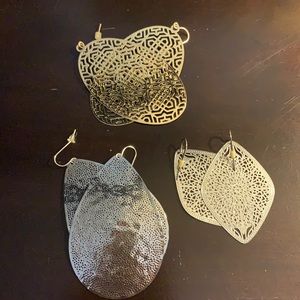 A group of three pair of dangling earrings, sold together
